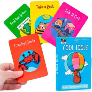 Colourful cards spread with hand holding one red card